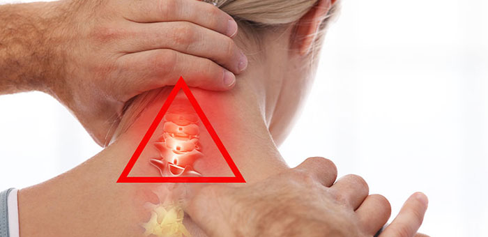 Phoenix chiropractor adjusting woman's neck for whiplash